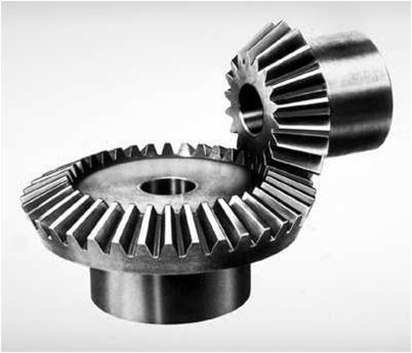 <p>Meshed gears that have angled spurs to change the direction of the ouput.</p>