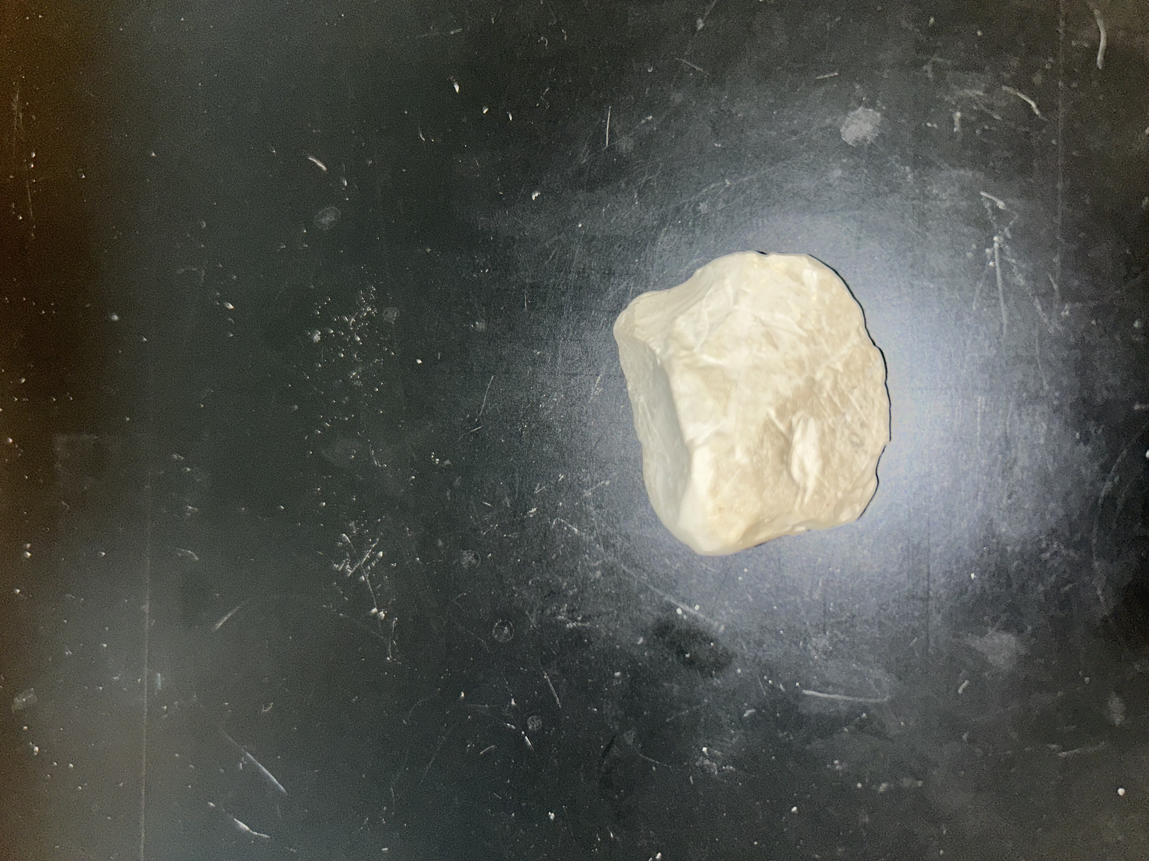 <p>powdery, soft, white</p>