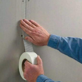 <p>It is also known as<strong> gypsum tape</strong>. It fills the gaps formed where <strong>gypsum boards join together. </strong>It is then covered with putty and smoothed over with sandpaper.</p>