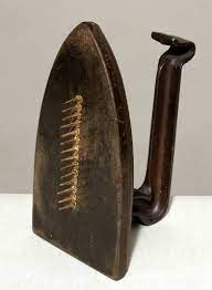<p>Man Ray, The Gift, 1921</p>