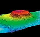 <p>Underwater seamount volcano. Often topped with limestone (carbonates); flat-topped. Undergo early cementation; walls are prone to collapse. Produce thick carbonate breccias</p>