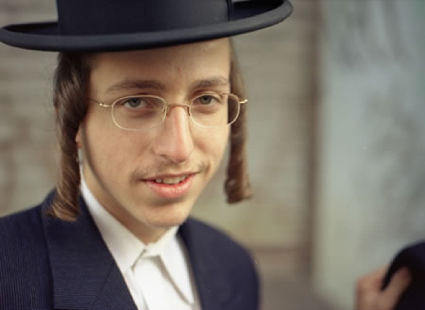 <p>Uncut hair and side locks for Hasidic Orthodox Jews</p>