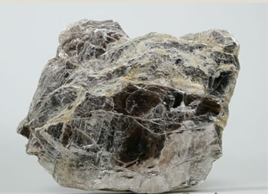 <p>Thin sheets as in mica</p>