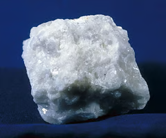 <p>metamorphic, dominant minerals are calcite, dolomite, and serpentine. coarse/fine texture, effervesces with cold diluted HCl.</p>