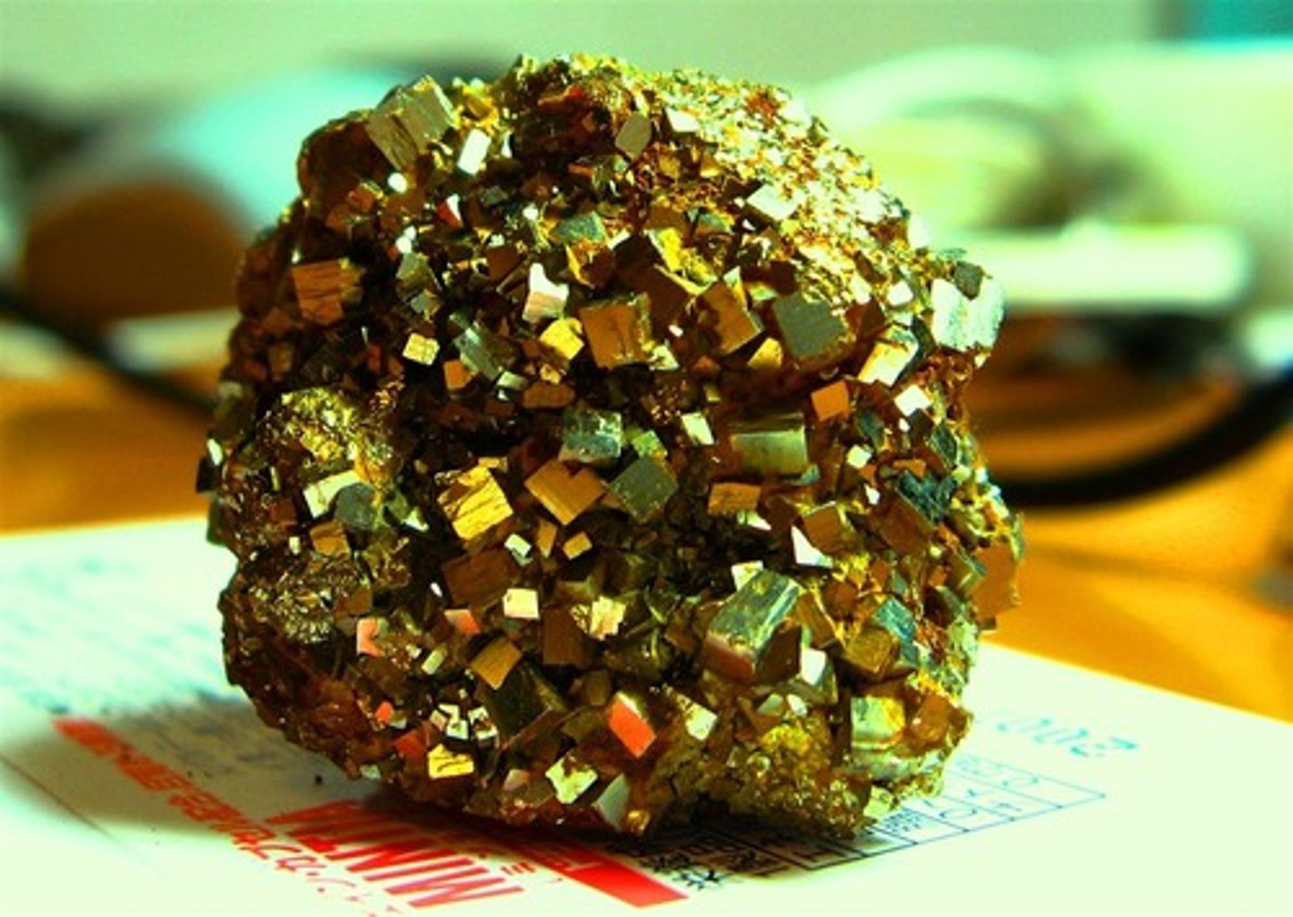 <p>metallic luster, golden yellow color, 6-6.5 hardness</p>