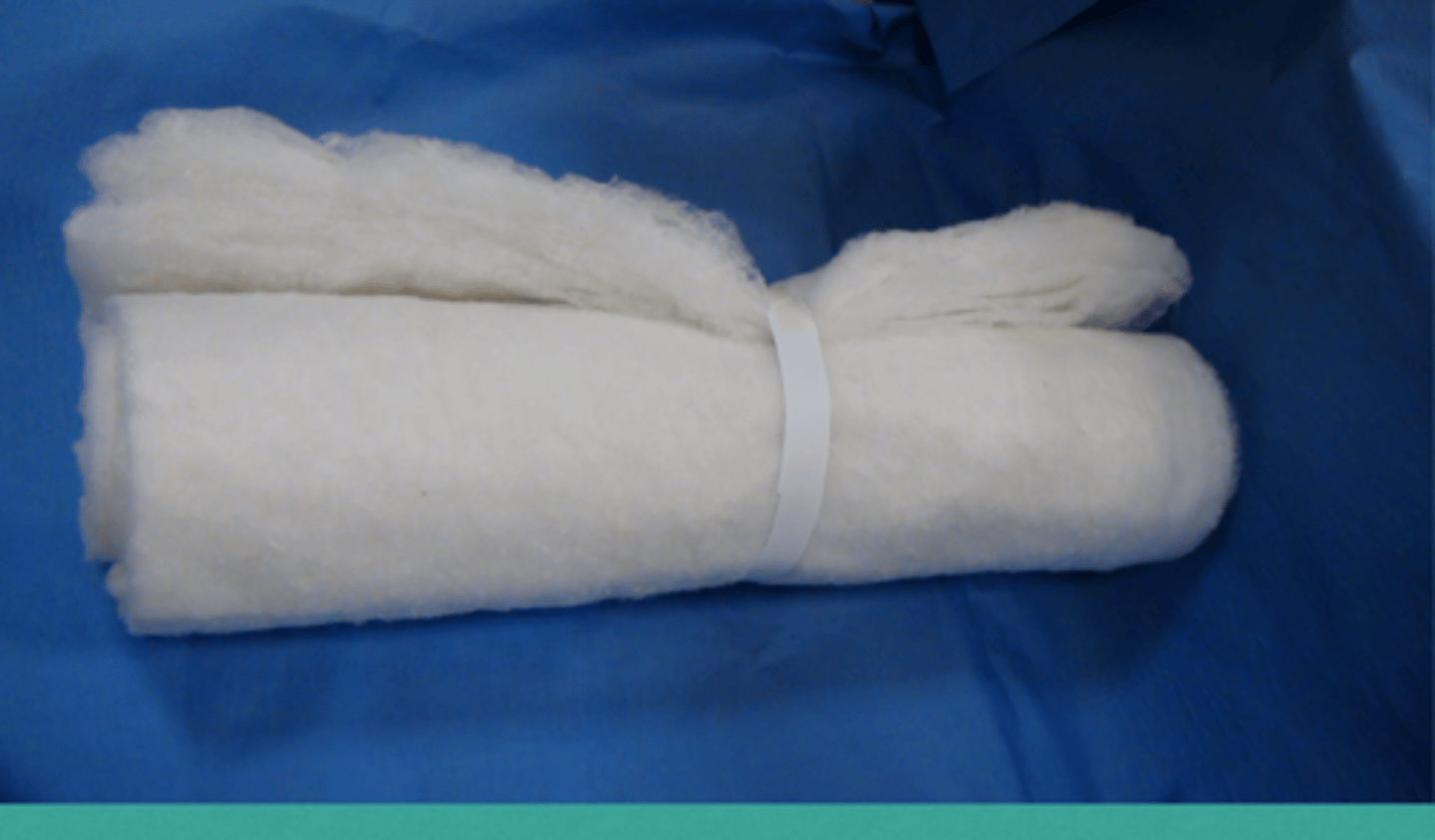<p>Non sterile sheet cotton is useful for padding on limbs. It should not be placed against open wounds, as it is not sterile and slightly abrasive. it provides protective padding and support and is very absorbable. Because it is slightly stiffer than the rolled cotton, it provides more immobilization.</p><p>Secondary Layer</p>