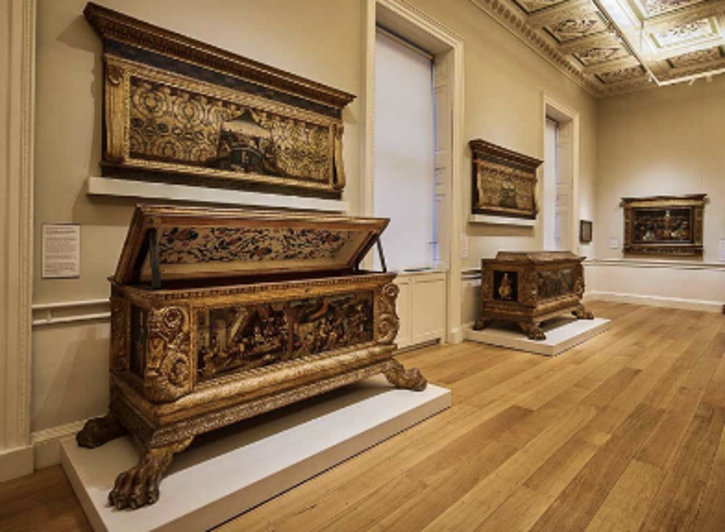 <p>A painted headboard of a marriage bed, or the front panel of a chest, or the back of a wooden bench</p>