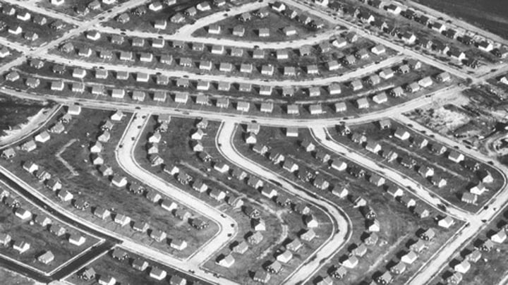 <p>Post-WWII Suburban areas that were practically factory made and then put together which each house look the same.</p>