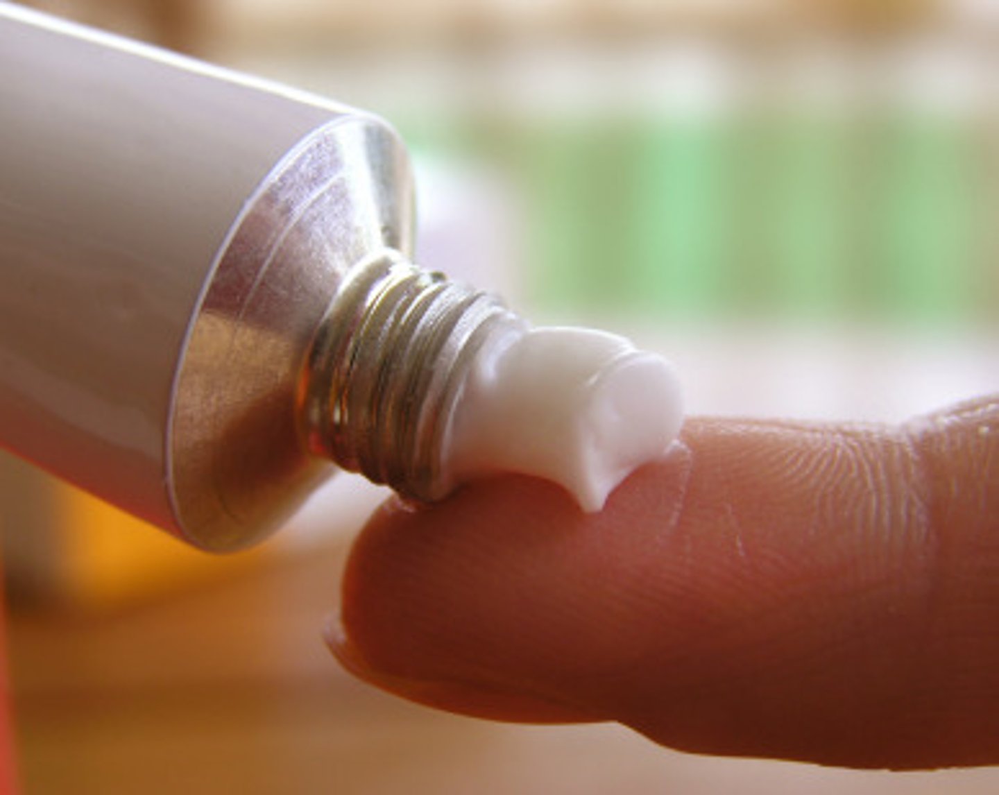 <p>(n) a liquid rubbed into the skin to relieve aches or pain (such as muscle stiffness)</p>