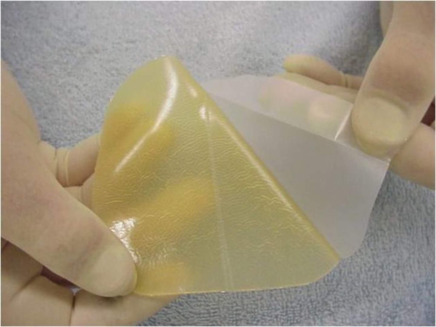 <p>Adhesive wafer composed of gelatin, pectin, and carboxymethyl-cellulose</p>