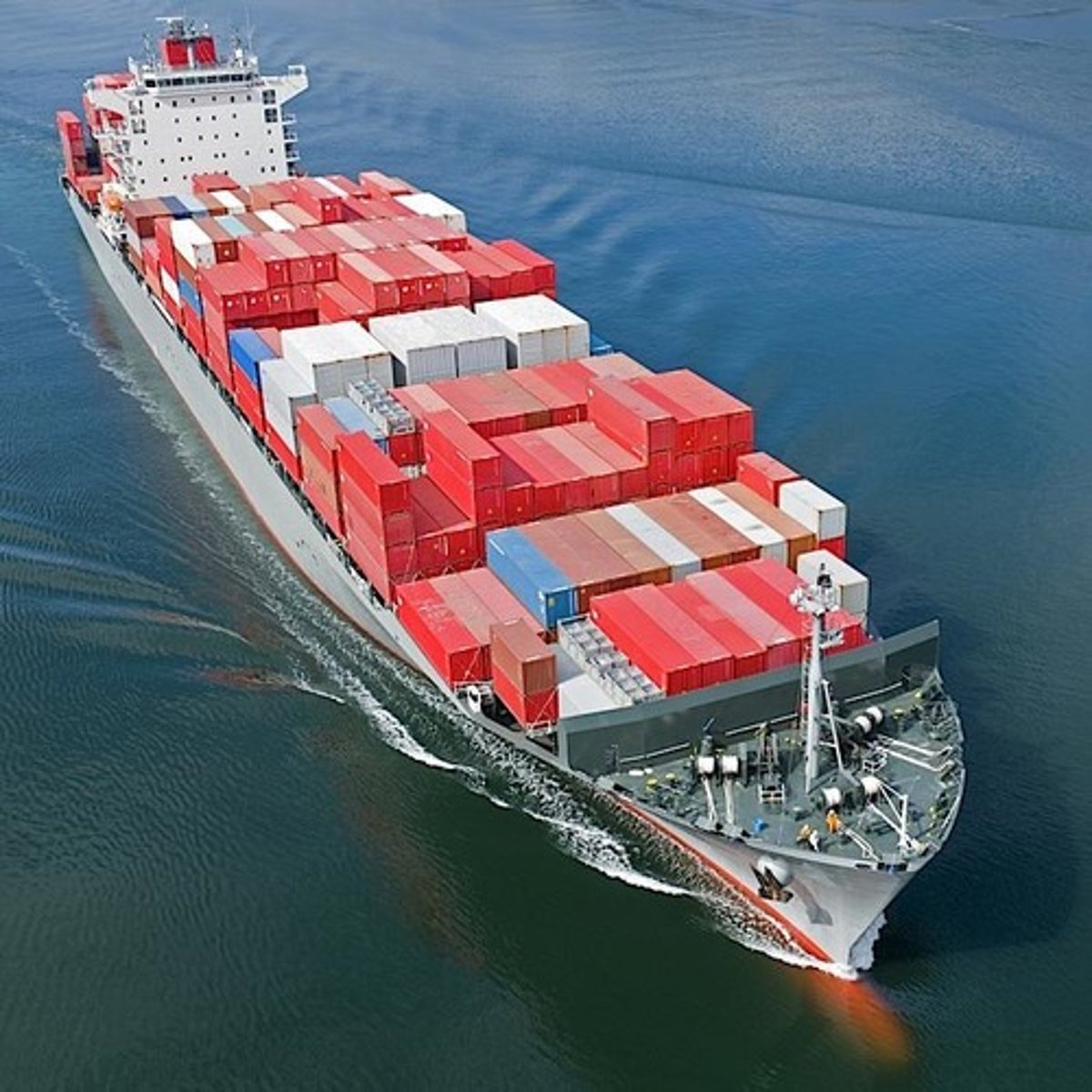 <p>large metal boxes used to store goods on ships; can be easily removed from ships to a train or semi truck trailer</p><p>Standardized shipping containers streamlined global trade, enabling goods to be transported more efficiently via ships, trucks, and trains.</p>