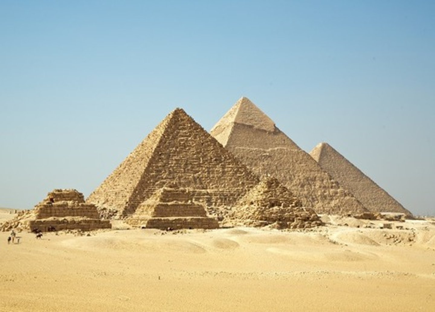 <p>All built by 4th dynasty pharaohs (Khufu, Khafre, and Menkaure)</p><p>Khufu:</p><p>first to be build, largest.</p><p>Would've been built with white limestone on the outside. Sun would've been shining off of it</p><p>Passage ways inside. Burial chambers throughout.</p><p>-Unfinished chamber built into bedrock of the pyramid</p><p>Spirits of king are worshiped as a deified ancestor</p><p>-Architecture still shows how a king is respected as a celestial king even after life. Don't turn king into god, but make him the eternal sovereign of egypt. Separation in cultic duties to the gods and as the pharaoh.</p><p>Khafre:</p><p>The only pyramid with the sphinx out of the three. Protective feature and likely built to guard pathway from the funerary complex</p><p>-Sphinx gate at Hattusha (from the Hittites) can be compared to this. Shows how the societies have been in contact with each other even if this consisted with battle</p><p>Menkaure:</p><p>last pyramid</p>