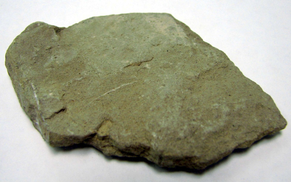 <p>Fissile (breaks into thin sheets), small grains visible, sedimentary</p>