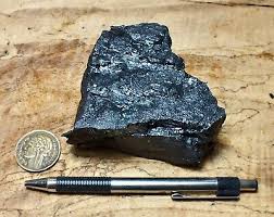 <p>-sedimentary </p><p>-biochemical</p><p>-organic carbon </p><p>-wont react to HCl</p><p>-forms from <span>the transformation of buried plant material, particularly peat, under high pressure and heat over millions of years</span></p><p><span>uses: electricity generation</span></p>