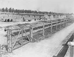 <p>The first Nazi concentration camp, established in 1933 near Munich, Germany, served as a model for later camps. Infamous for its harsh conditions and systematic brutality, it became a symbol of the atrocities committed during the Holocaust, housing political prisoners, intellectuals, and various marginalized groups targeted by the Nazi regime.</p>