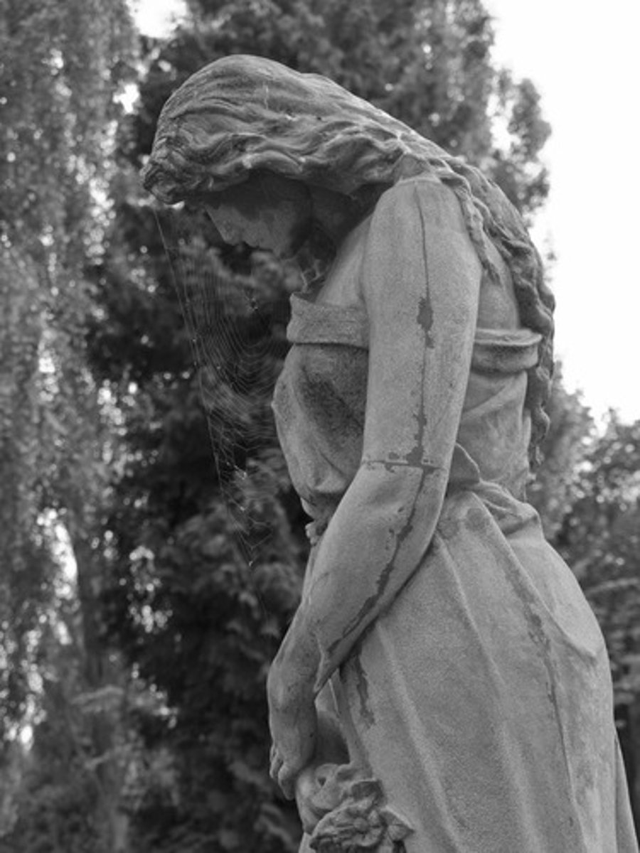 <p>3-D work of art, statue; "in the round"</p>