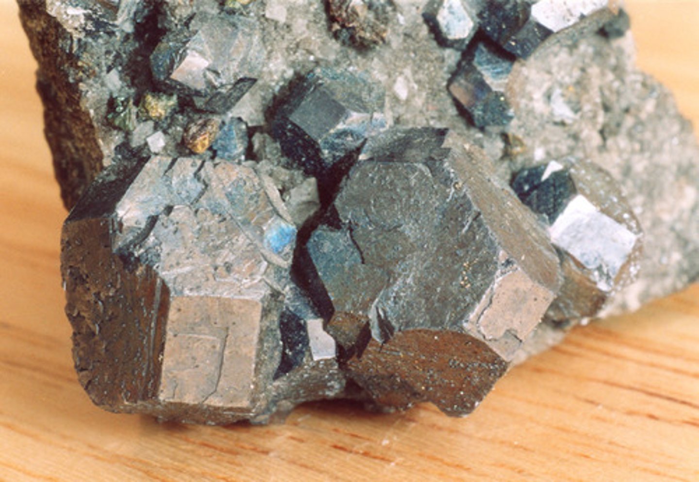 <p>Perfect cubic cleavage and is very heavy. State mineral.</p>