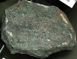 <p>-metamorphic</p><p>-nonfoliated</p><p>-crystalline</p><p>-garnet, pyroxene, quartz</p><p>-proliths: mafic volcanic, plutonic rocks, gabbro, basalt</p><p>regional metamorphism - high grade </p><p>uses: geologic research </p>