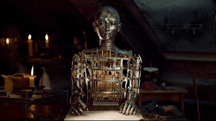 <p>a device that operates automatically or a person who acts in a mechanical fashion. </p>