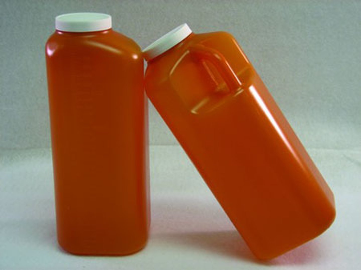 <p>A sealed collection container with a non-venting spout which permits liquid to be poured the container when inverted.</p>