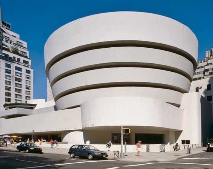 <p>Modernist architecture; created as a series of organic shapes; circular forms spiral down like the interior of a nautilus shell</p>