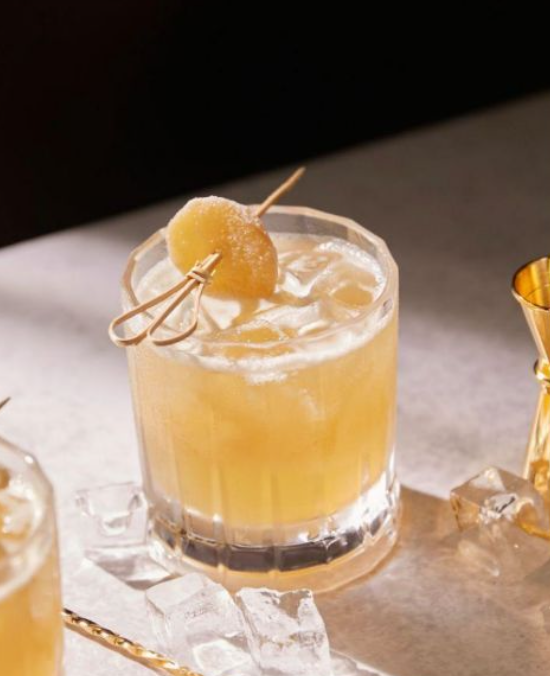 <p>Johnnie Walker Black blended Scotch whisky, ginger, lemon, honey peated whisky</p>