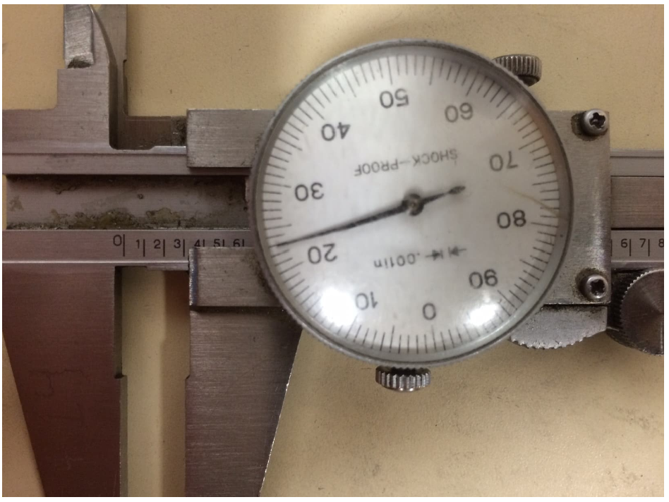 What is the measurement on the caliper below (in inches)?