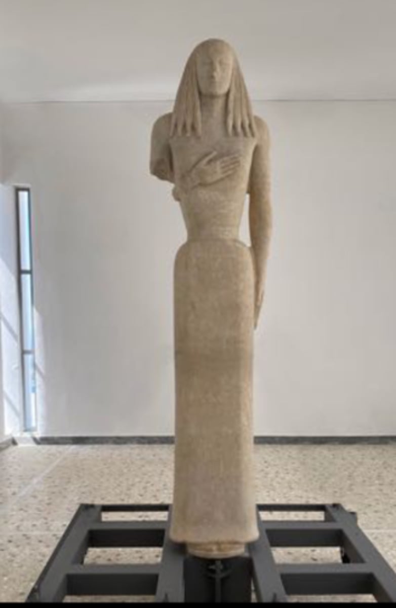 <p>Who: The Kore from Thera was created by ancient Greek artisans1.</p><p>What: The Kore from Thera is a statue made of white Naxos marble1. It is dressed in a long Doric veil and highlights the stylistic features of a woman's dress in the second half of the 7th century BC1.</p><p>Where: The Kore was discovered on the island of Santorini1. It is currently displayed at the renovated local museum, the Greek Culture Ministry1.</p><p>When: The Kore dates back to the second half of the 7th century BC1.</p><p>Why it's interesting and important: The Kore from Thera is significant for several reasons:</p><p>It is a rare masterpiece of Greek sculpture from the 7th century BC1.</p><p>It is one of the few surviving examples of archaic large-scale stone sculpture, which typically features standing statues of either a Kouros (male youth) or a Kore (young maiden), expressing that era's archetype of beauty1.</p><p>The almost intact female figure dressed in a long Doric peplos uniquely complements our knowledge on the development of the Kore type in the second half of the 7th century BC, as its perfect preservation highlights its stylistic characteristics and unique artistic value1.</p><p>It also reveals the economic prosperity but also the ostentation of the islands aristocracy, as well as their aesthetic preferences and their understanding of the arts1.</p>