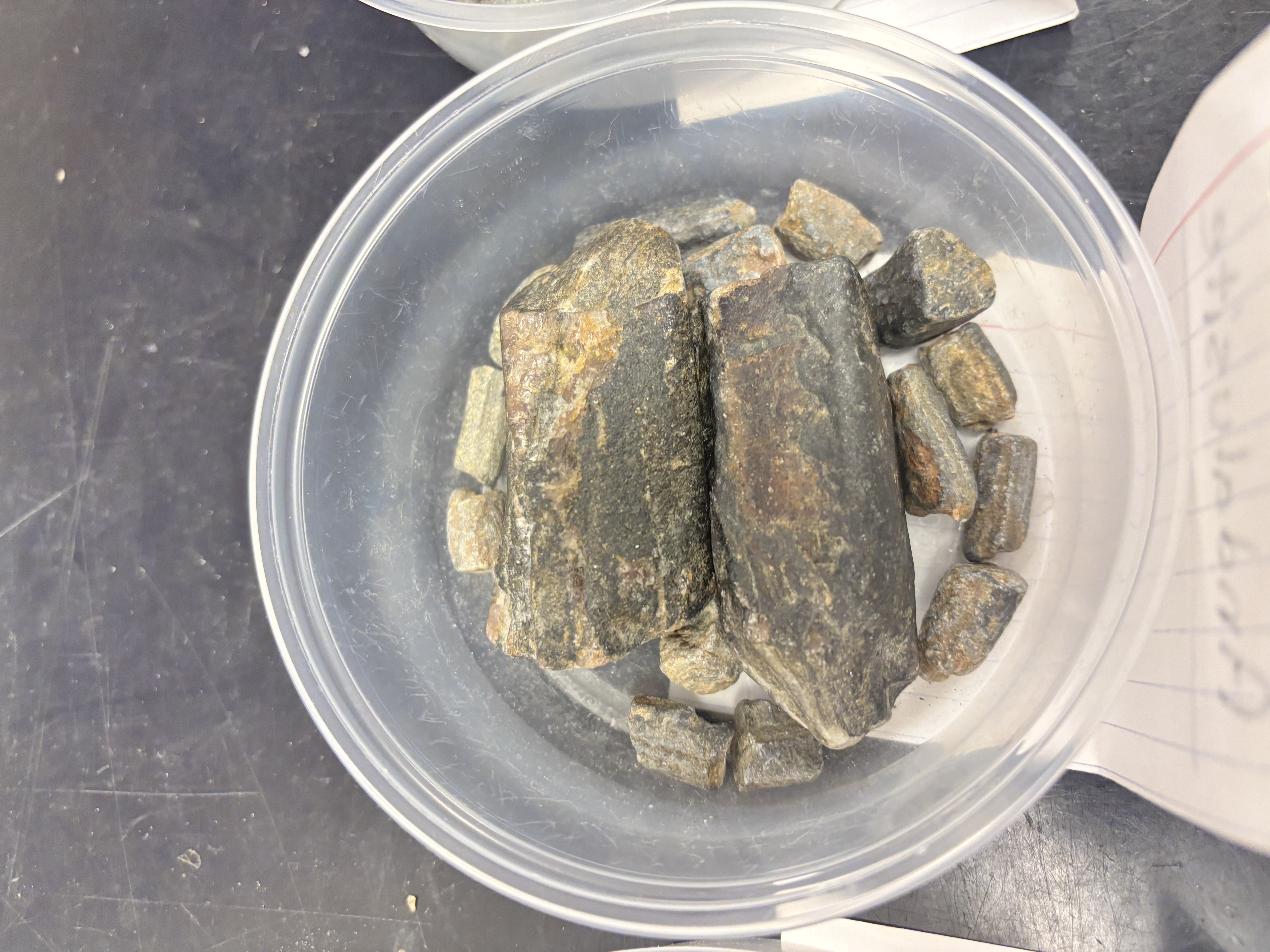 <p>Columnar pink or gray mineral; low-pressure, high-temperature polymorph of Al₂SiO₅ group.</p>