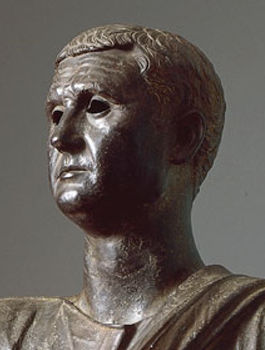 <p>From Cortona, early 1st century BC, Etruscan and made of bronze. Statue highlights a political career with his hair cut and facial expression. Man who is modeled after was an Etruscan senator.</p>