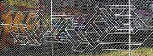 <p>taking yarn and weaving it through chain link fences</p>