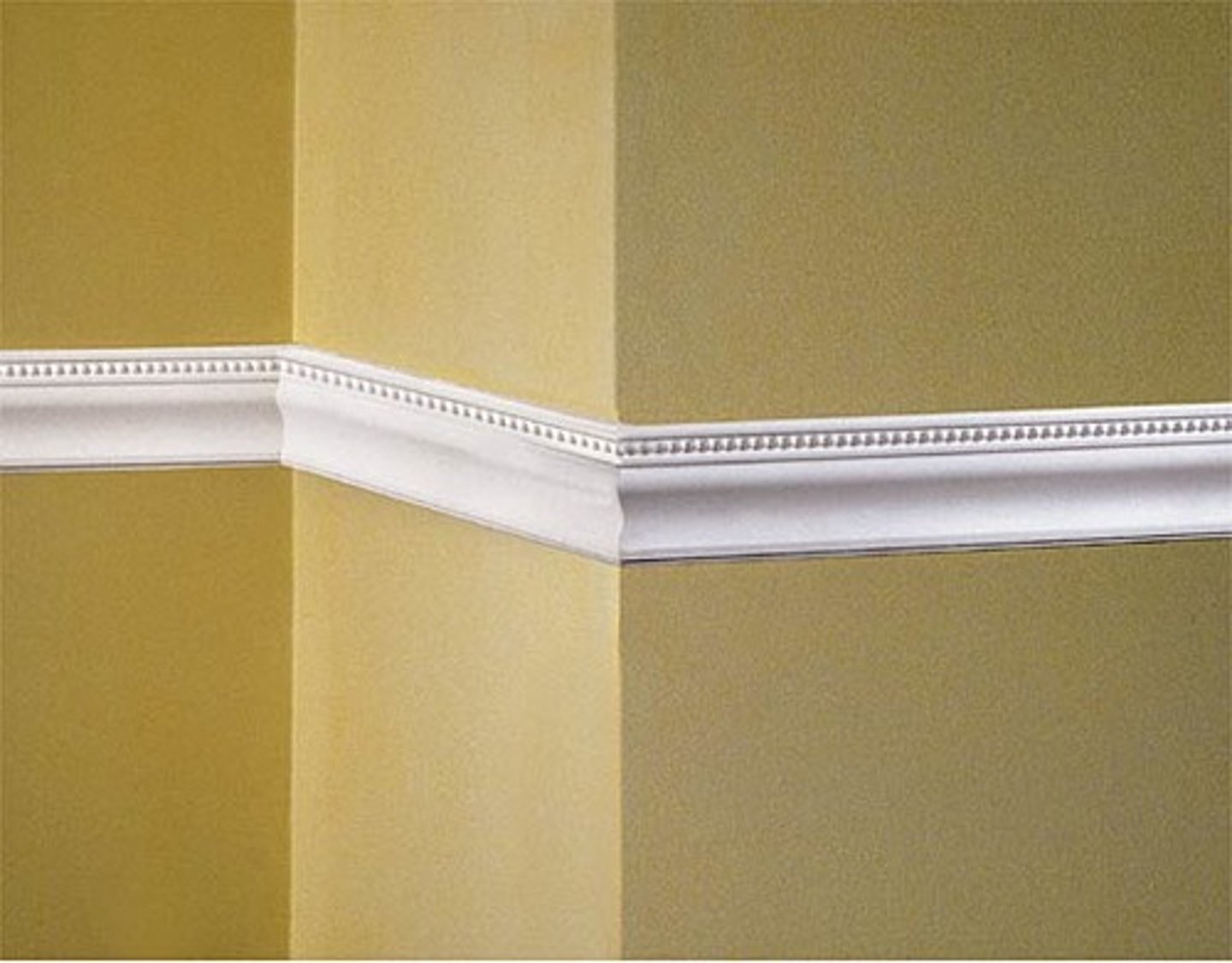 <p>Wood trim installed horizontally on a wall around a room usually about 30'' off the ground, used to scale down a large wall, further adorned with bead board, trim, wallpaper or contrasting paint colors, above and below</p>