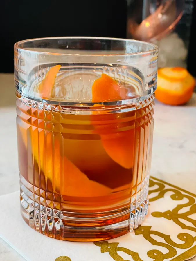 <p>old fashioned, 2 oz rye whiskey, 0.5 oz Fernet Branca, 0.25 oz simple syrup, served on the rocks, garnished with lemon twist</p>