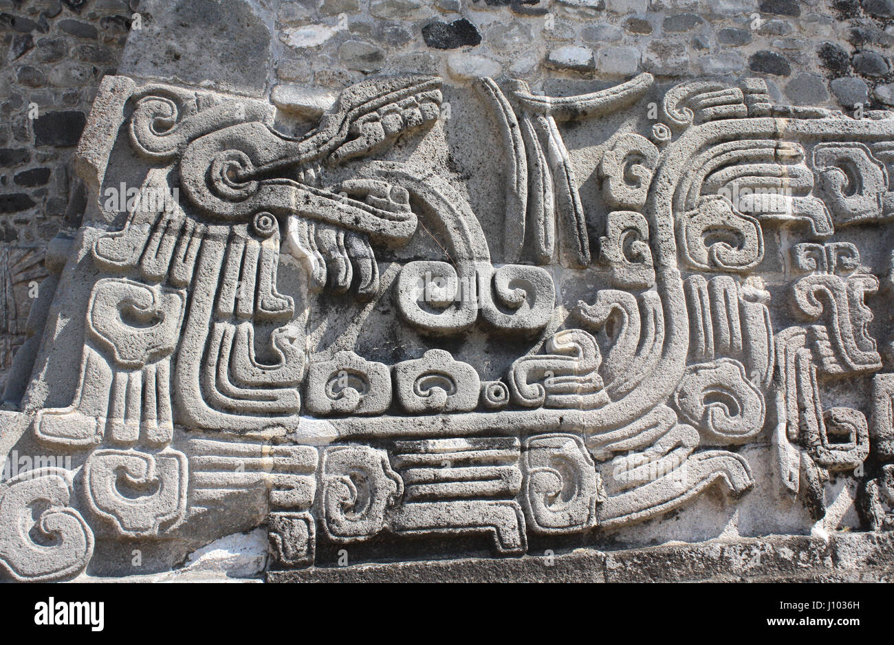 Along the sides, considered a “relief sculpture”