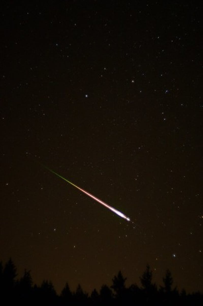 <p>a rock burning in the atmosphere</p>