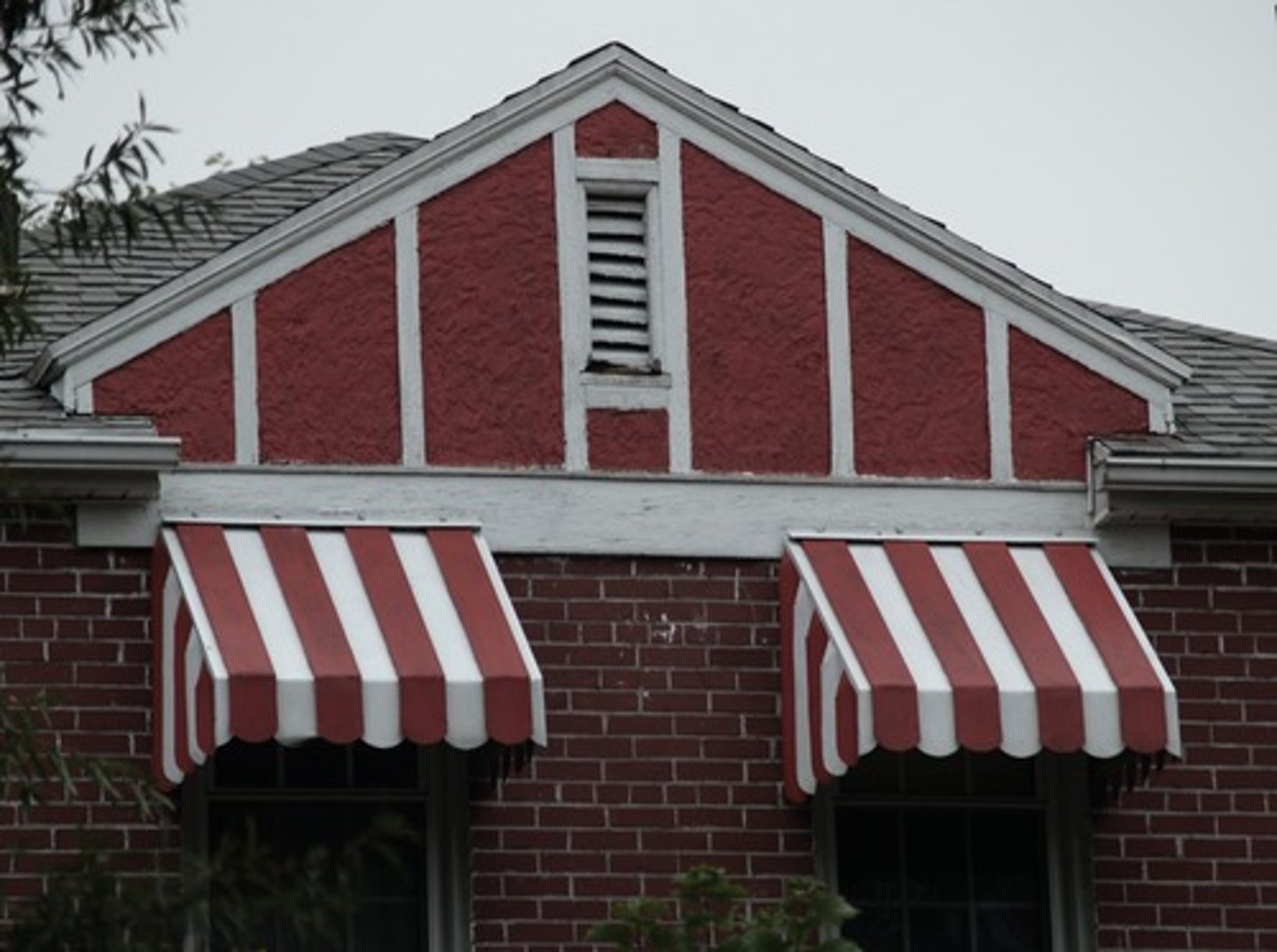 <p>a rooflike cover, often made of canvas, which extends over an area or a window as a shelter.</p>