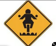 Road surface conditions may be rutted, grooved, or pose another danger.

\
