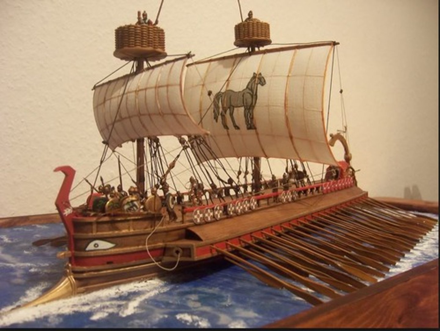 <p>a type of boat used by the Ancient Greeks; had three rows of oars on each side</p>