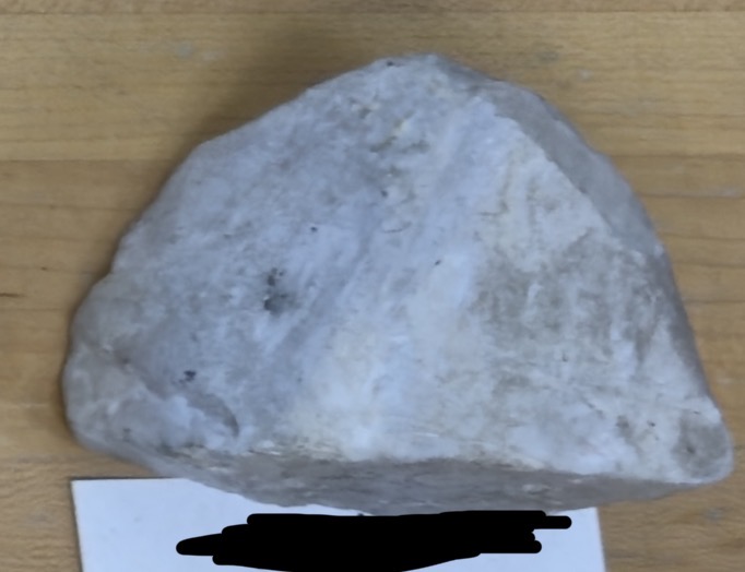 <p>white/grey color, 2 right angles</p>