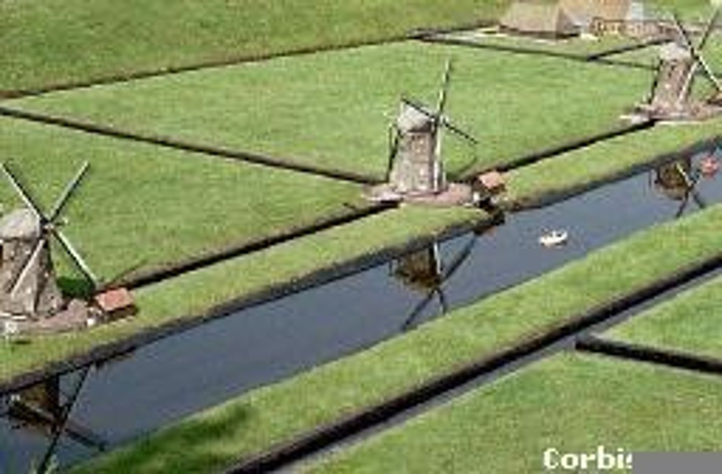 <p>A low-lying area of land that has been reclaimed from the sea by building dikes around it and then pumping the water out.</p>