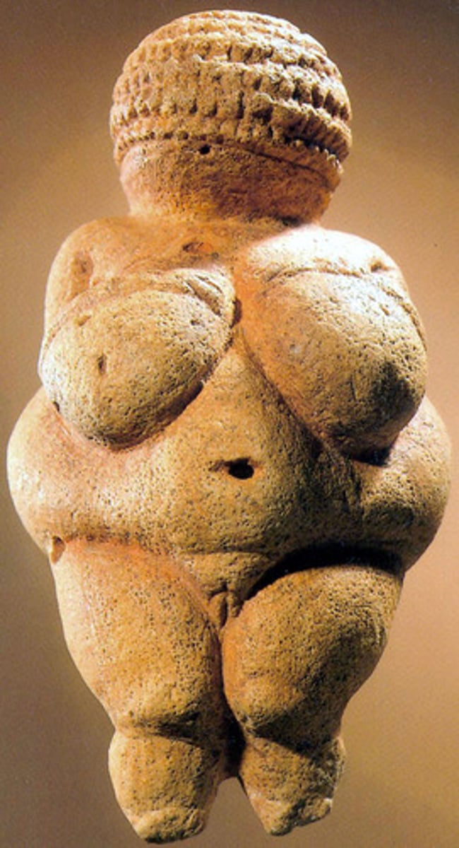<p>limestone; portable (usually very small); made with exaggerated features b/c women are important for reproduction</p>