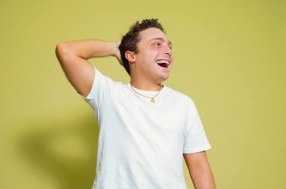 <p>The t-shirt</p><p>Jake Shane is happy in his white shirt </p>
