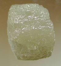 <p>Luster that appears as if mineral is coated in oil or grease</p>