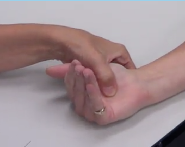 "Can you bring your finger tips up towards the ceiling? Your fingers will be going from bent, to straight up in the air"