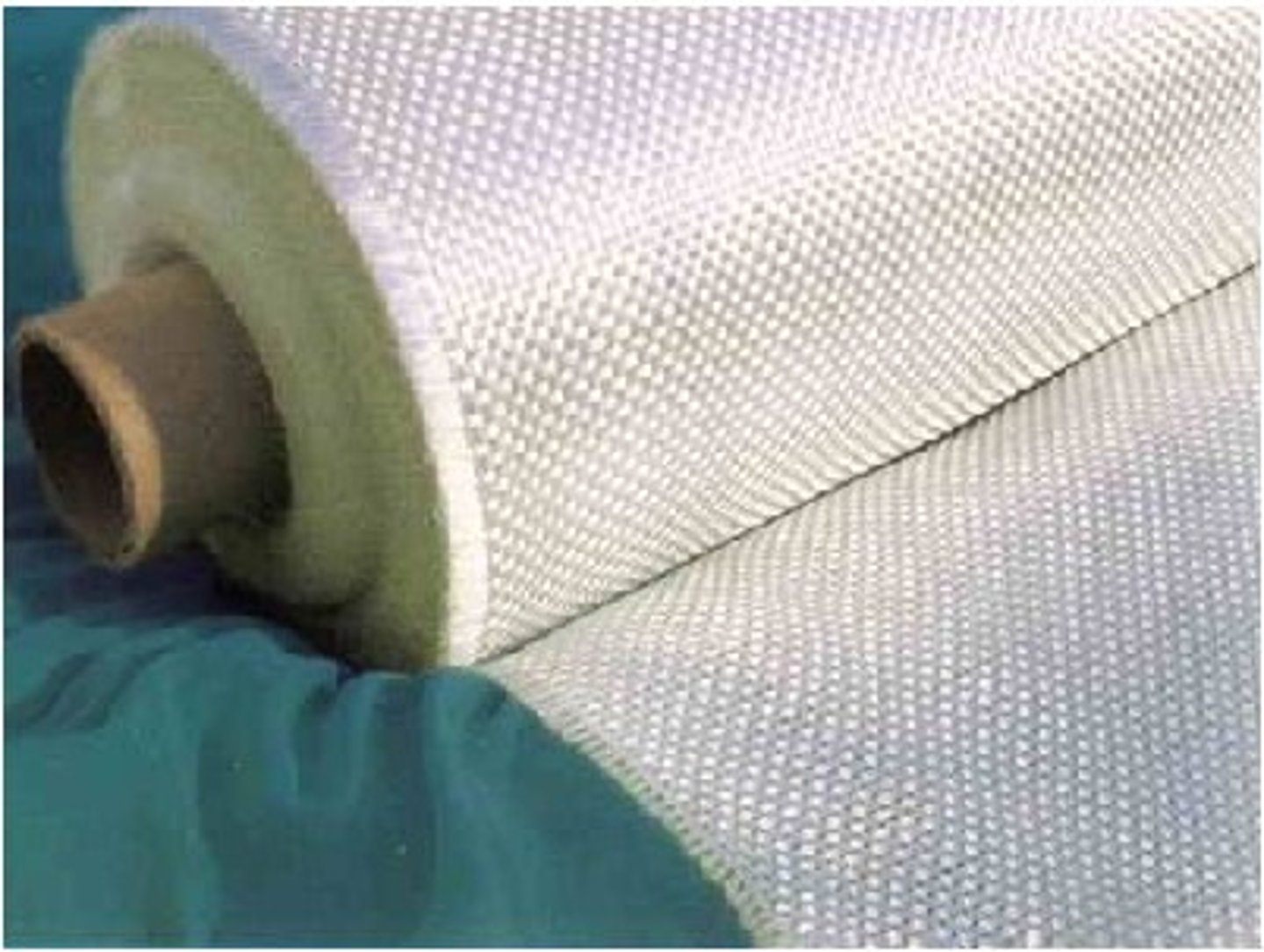 <p>Glass spun to produce a fibre. Coated to aid bonding to resin. Laying up process</p>