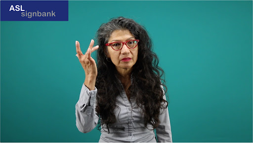 <p>Bounce middle finger up and down while furrowing your eyebrows</p>