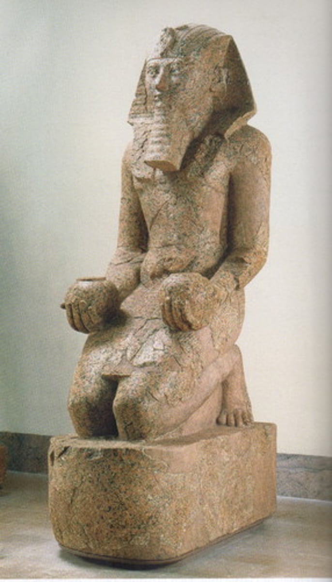 <p>EGYPT.</p><p>- New Kingdom</p><p>- Eighteenth Dynasty</p><p>- Red Granite</p><p>- Represented as a male king wearing a kilt &amp; linen headdress, occasionally even a king's false beard</p><p>- She was adapted to conform to convention</p><p>- She adopted the male costume of a king</p>