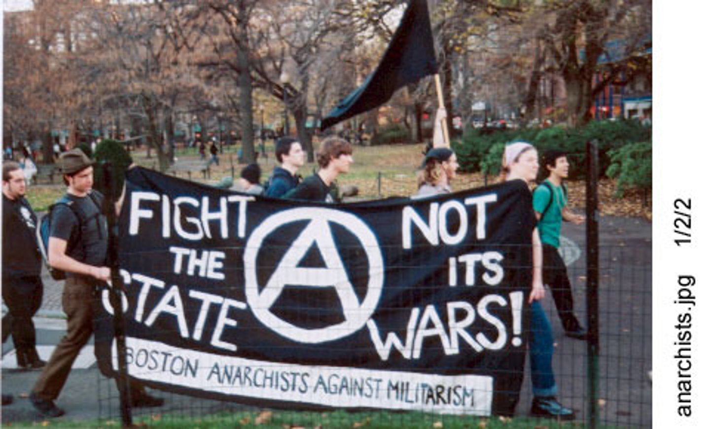 <p>(n.) One that believes in a society without any form of government or authority</p>