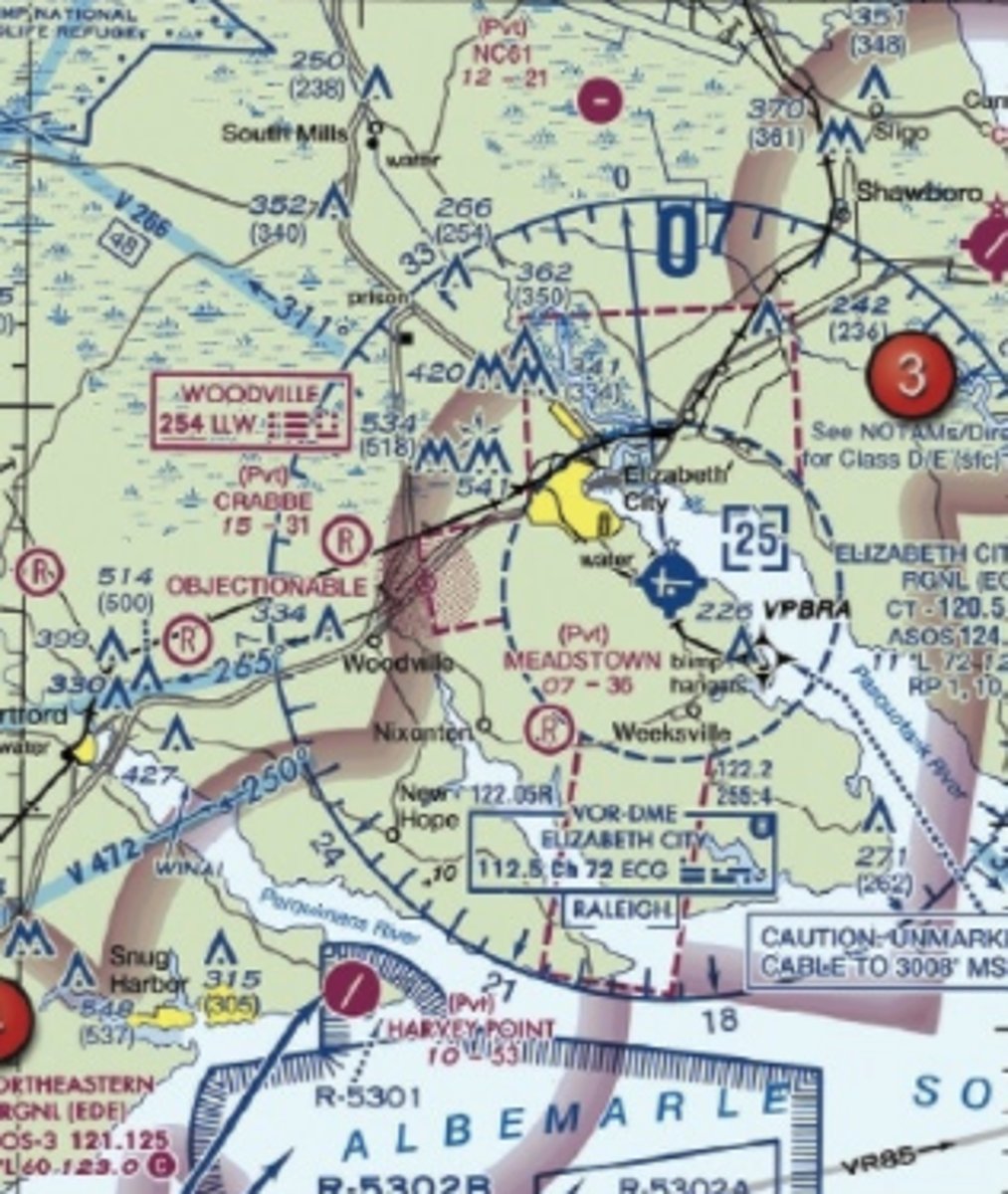 <p>C) 500 feet AGL.</p><p>[This is a very sneaky question. If you read carefully in the aeronautical chart user's guide on page 12 it says, "Whenever possible, the FAA depicts specific obstacles on charts. However, in high-density areas like city complexes, only the highest obstacle is represented on the chart using the group obstacle symbol to maximize legibility."]</p>