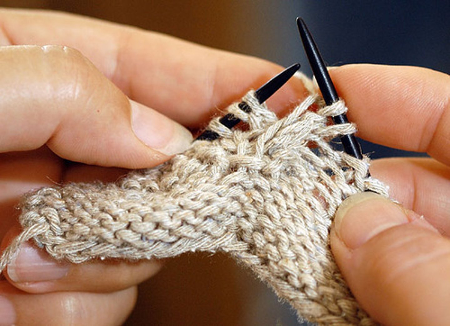<p>consists of creating a series of interlocking loops using straight knitting needles that are pointed on one end.</p>